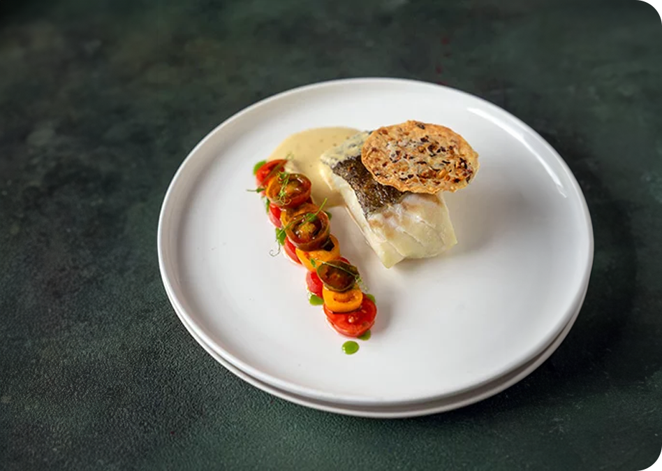 Sous-vide skreihaasje met mosselspoom en krokante tomaten