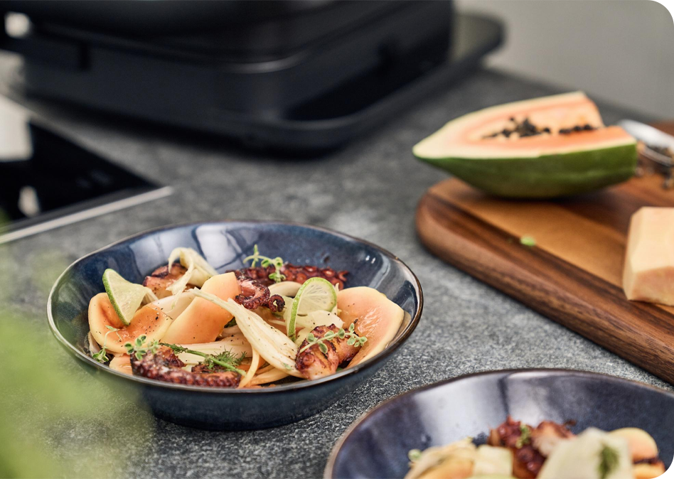 Papaja-venkelsalade met gegrilde octopus en citroendressing