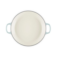 cast-iron-petal-shallow-casserole-26-sea-salt-le-creuset-2_126625757080307193108166.png